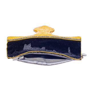 Paint brush pouch shown on its side with zipper open, revealing the cotton-lined interior