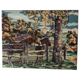 Vintage French needlepoint of two brown horses at a wooden rail fence beneath a large tree, farmhouse and autumn foliage behind — Margot de Paris design L'Enclos