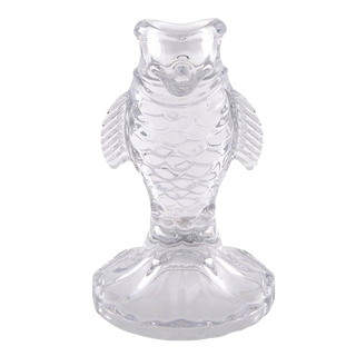 Clear glass fish-shaped object on a white background