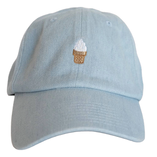 Front view of the light denim soft serve ice cream cone baseball cap with adjustable strap, embroidered cone centered